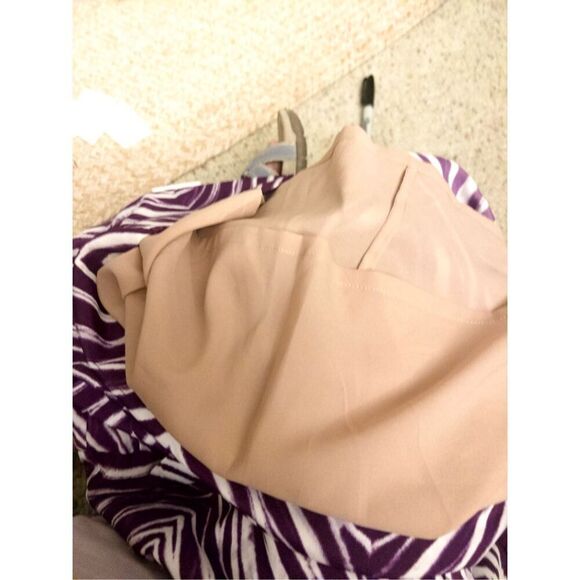 BCBG purple zebra print   Flowing and light, this dress is flattering and functi - Picture 9 of 9